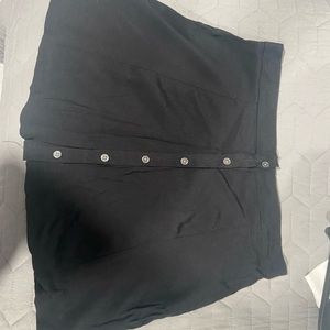 Black skirt, front buttons all the way up